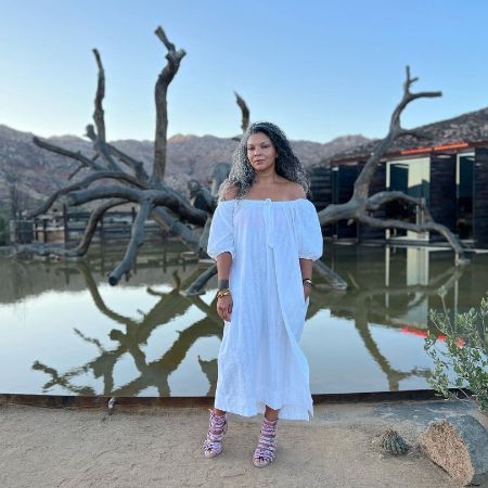 Ife Sanchez Mora posted a picture wearing a white dress on Instagram. 